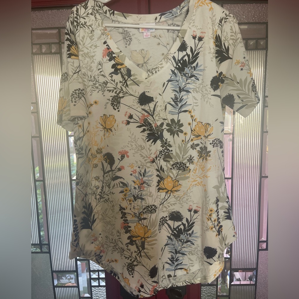 LuLaRoe shirt with floral pattern